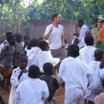 Peak Active Sport's Steve Brackenridge with kids in Uganda